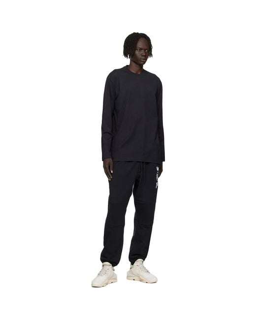 Y-3 Black Cuffed Track Pants for men