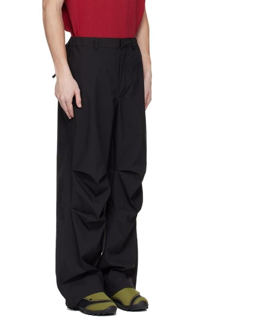 【関税込み】RAINS ブラック Suva Hardshell ワイドパンツ Rains® Suva Hardshell Pants Wide in Black for €189 | 2-Year
