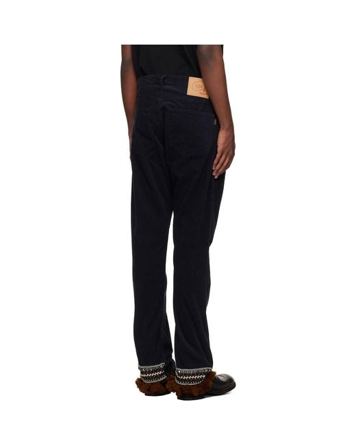 Undercover Black Contrast Hem Trousers for men