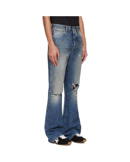 Amiri Blue Slashed Bootcut Jeans for men