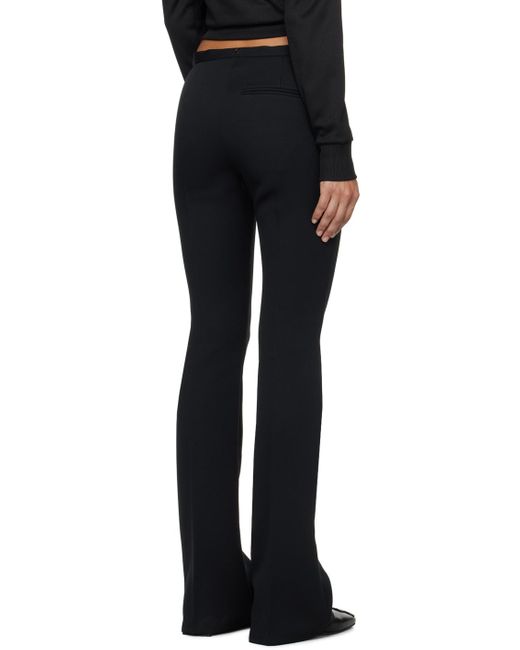 Pantalon ajusté noir Courreges en coloris Black