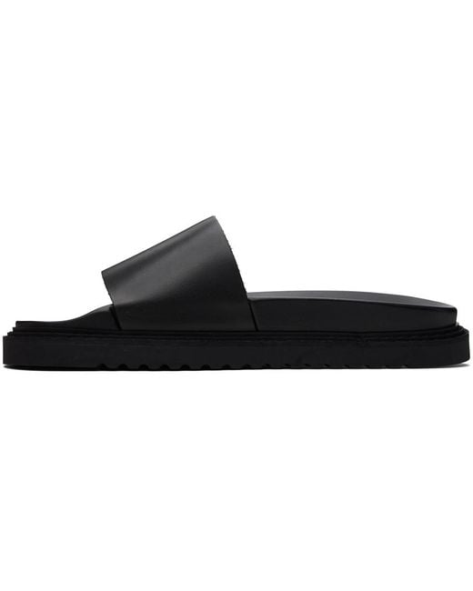 Sandales à enfiler noires à logo gaufré Boss pour homme en coloris Black