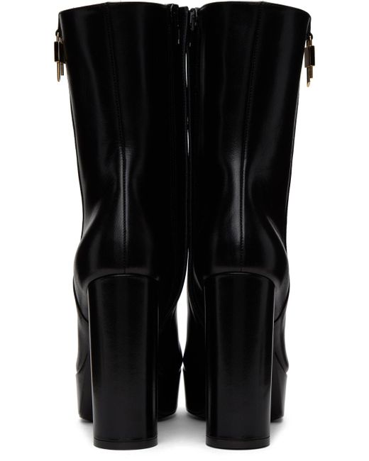 Bottes noires à plateforme et à cadenas à logo Givenchy en coloris Black