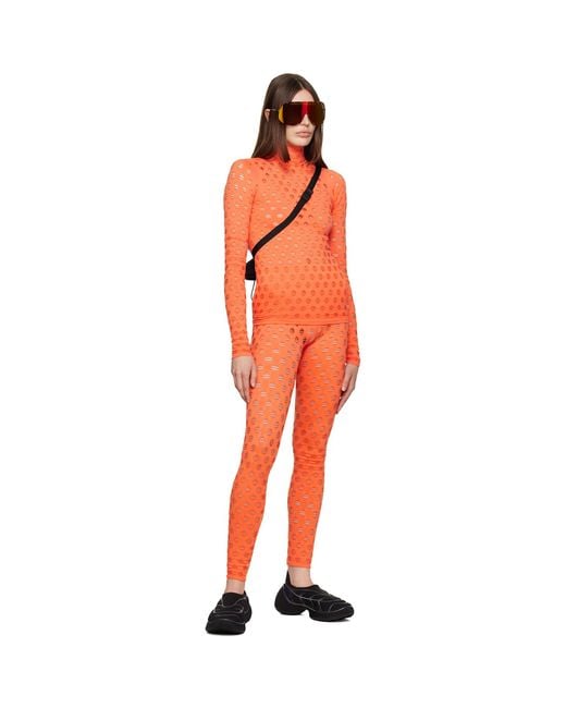 Maisie Wilen Orange Perforated Turtleneck