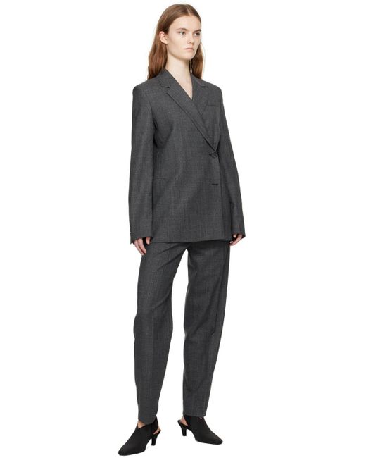 Pantalon gris à plis Totême  en coloris Black