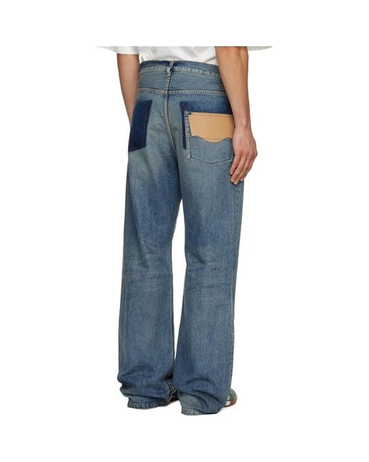 Maison Mihara Yasuhiro Blue Flared Jeans for men