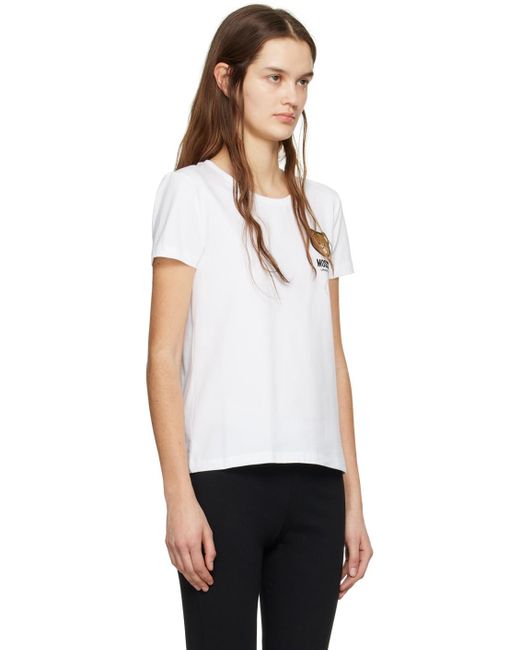 T-shirt blanc à appliqués à logo Moschino en coloris White