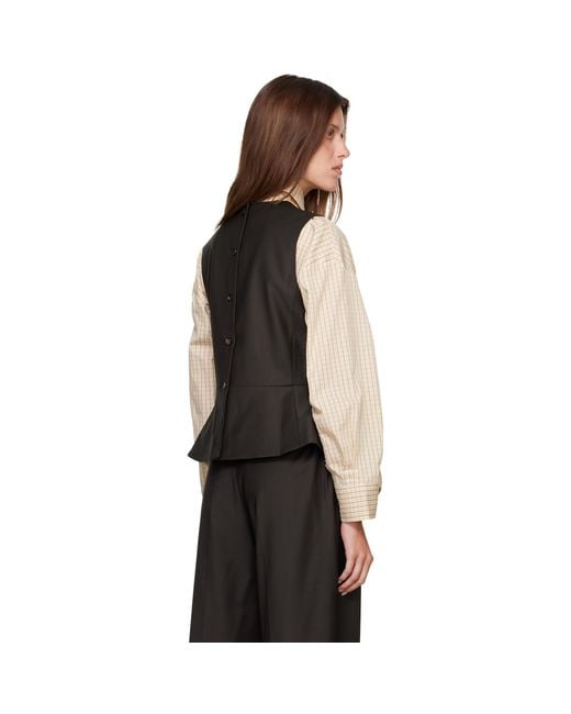 Cordera Black Tailored Peplum Top