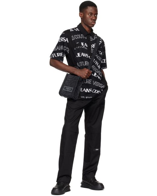 Polo noir à motif à logo modifié Versace pour homme en coloris Black