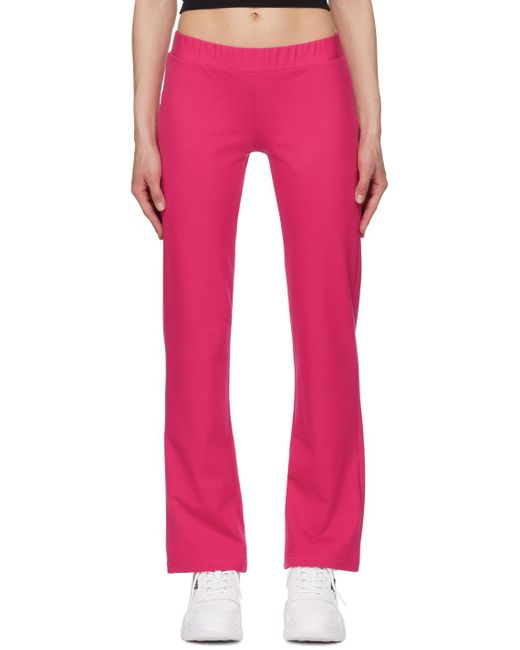 Pantalon de détente rose à ornements facettés Versace en coloris Pink