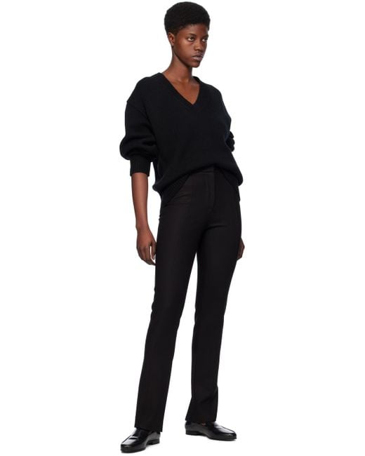Pantalon ajusté noir Totême  en coloris Black