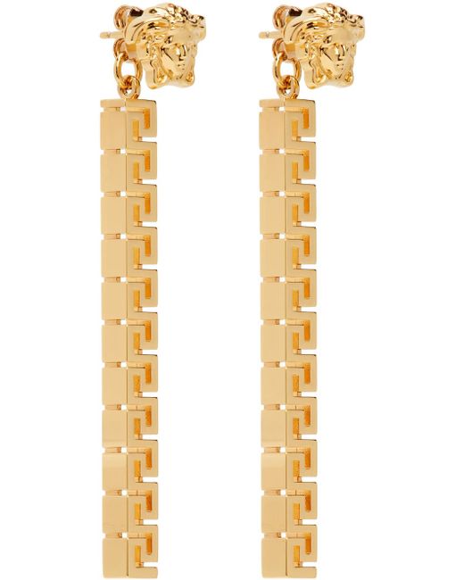 Boucles d'oreilles pendantes dorées à méduse et à motif à clé grecque Versace en coloris Multicolor