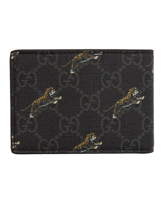 Portefeuille avec porte-monnaie GG à imprimé tigre Gucci pour homme en  coloris Noir | Lyst