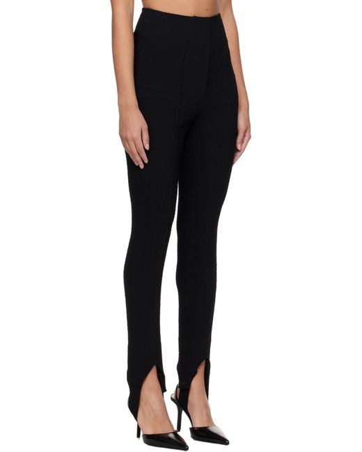 Pantalon Savita Noir En Tissu Gaufré À Sous-Pieds Nanushka en coloris Black
