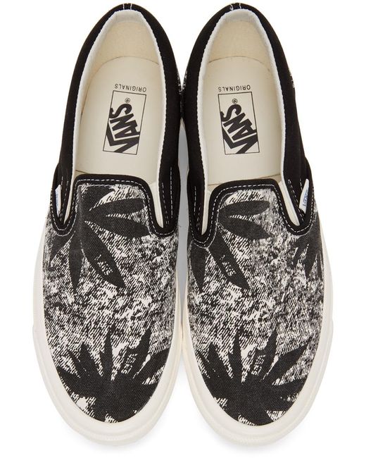 vans slip on black og