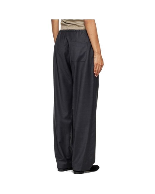 Ssstein Black Wool Silk Drawstring Easy Trousers