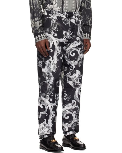 Pantalon noir et blanc à motif watercolor couture Versace pour homme en coloris Black