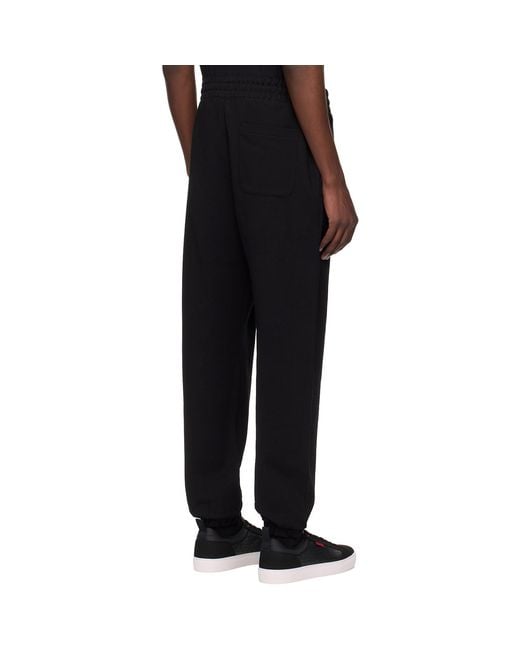 HUGO Black Cotton Terry Split Logo Sweatpants for men