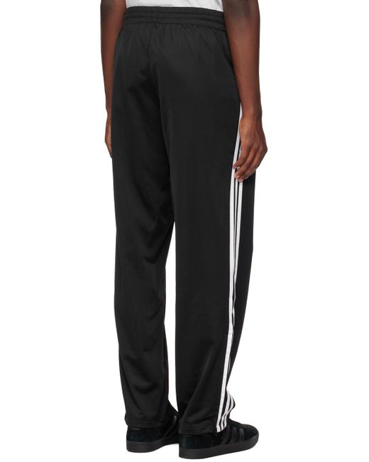 Adidas Originals Black Firebird Track Pants for men