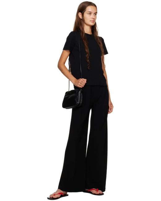 The Row Bourse Clutch in Black | Lyst