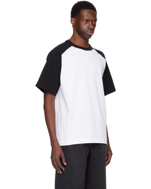 T-shirt noir et blanc à logo modifié gaufré Alexander Wang pour homme en coloris White