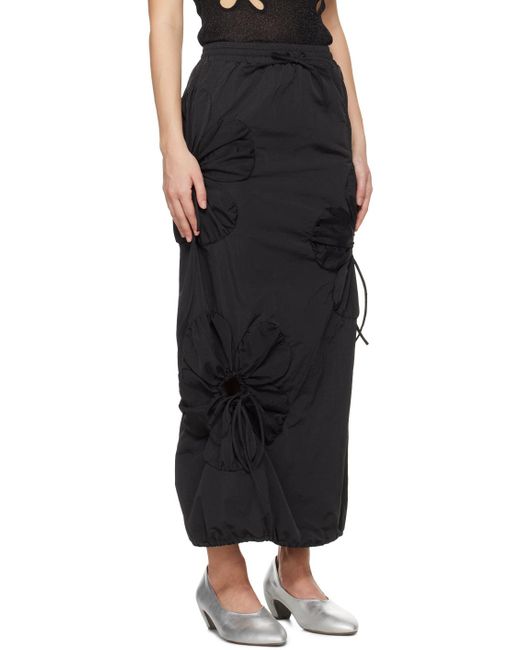 Jupe longue noire à appliqués floraux JKim en coloris Black
