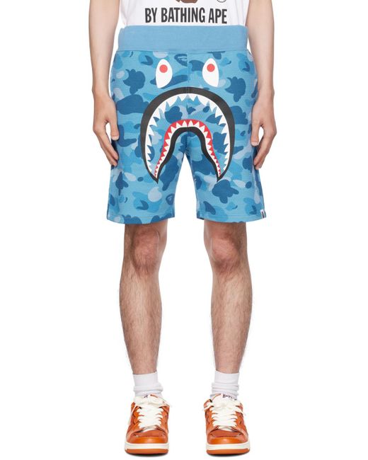 A Bathing Ape Blue Honeycomb Camo Shark Shorts for men