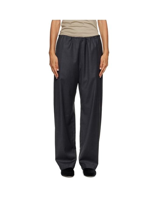 Ssstein Black Wool Silk Drawstring Easy Trousers