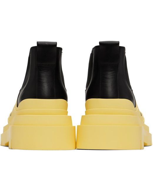 Bottega Veneta Black & Yellow Tire Chelsea Boots for men