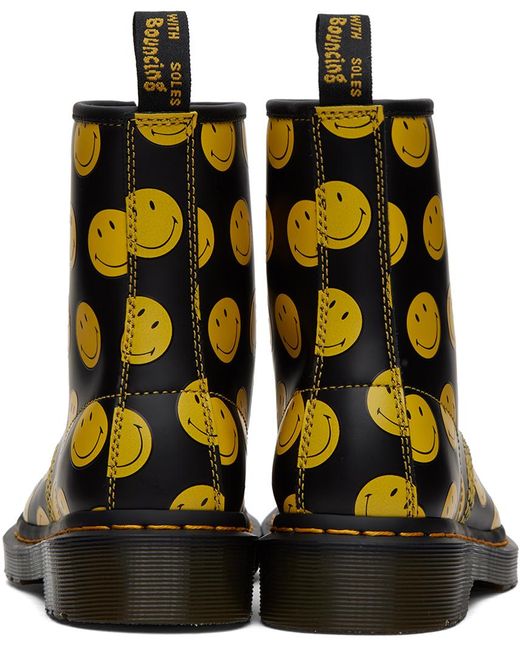 Bottes 1460 noir et jaune - smiley Dr. Martens en coloris Black