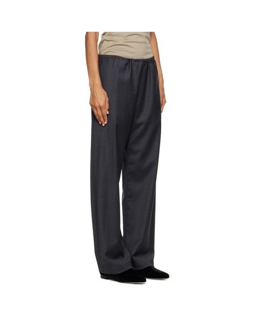 Ssstein Black Wool Silk Drawstring Easy Trousers
