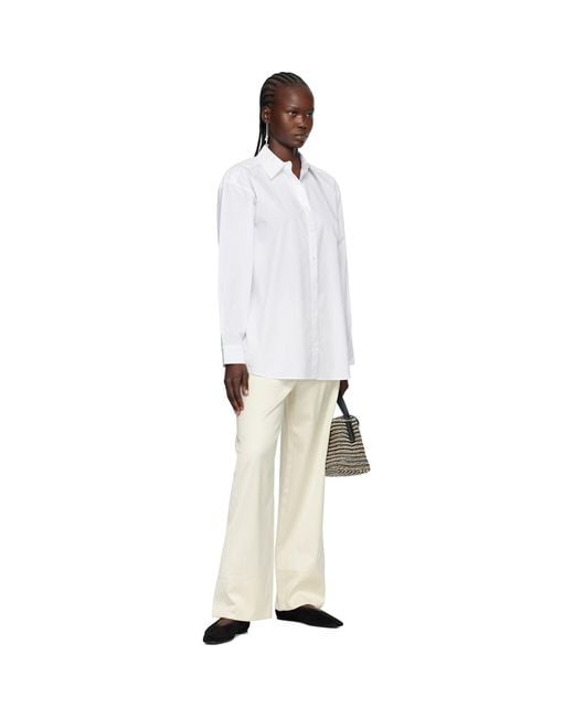 Totême Natural Off- Twisted Seam Trousers