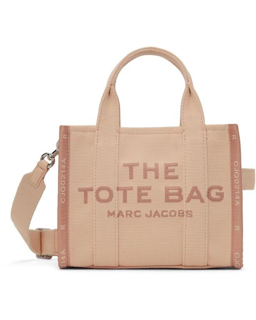 Petit cabas 'the tote bag' à logo et texte en tissu jacquard Marc Jacobs en coloris Natural