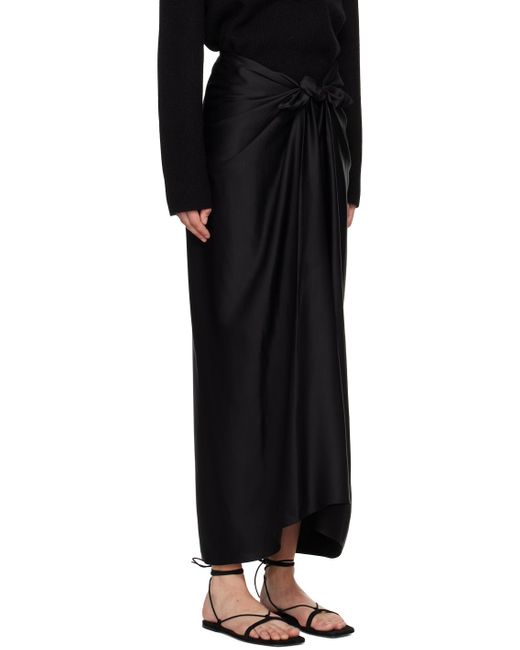 Jupe longue noire à ornement noué Totême  en coloris Black
