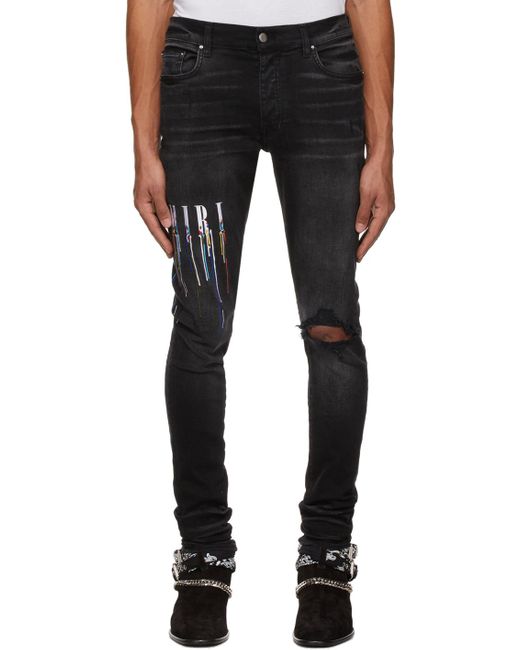 Amiri Denim Paint Drop Logo Jeans in Black for Men - Lyst