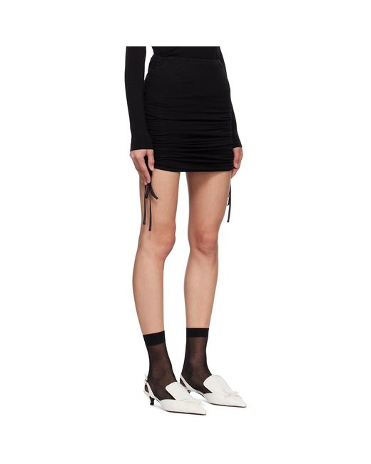 Minijupe Drapée Noire Pushbutton en coloris Black