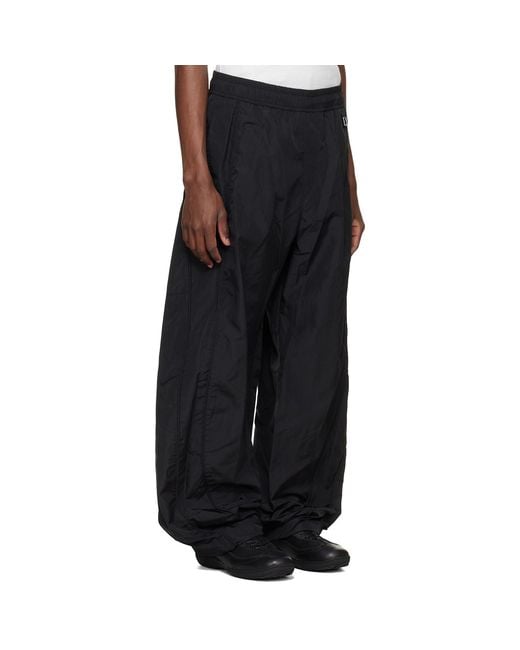 Wooyoungmi Black Barrel Leg Track Pants for men