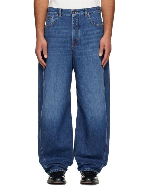 Jean Bleu En Denim À Effet Délavé Et À Coutures Extérieures Incurvées Givenchy pour homme en coloris Blue