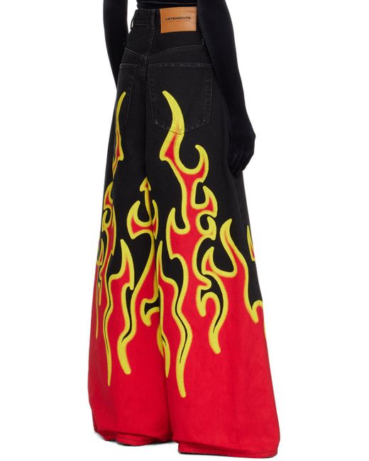 Jean surdimensionné noir et rouge à images de flammes Vetements en coloris Red