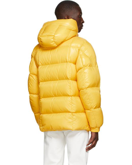 pastel yellow puffer jacket