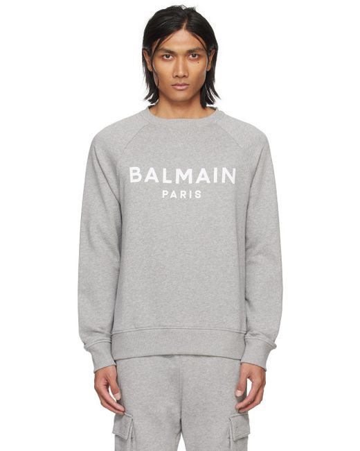 Pull molletonné gris à logo imprimé Balmain pour homme en coloris Gray