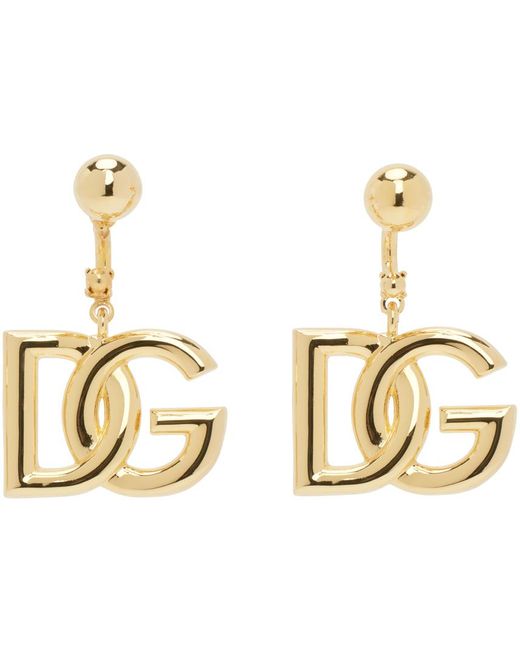 Boucles d'oreilles dorées à logo Dolce & Gabbana en coloris Metallic