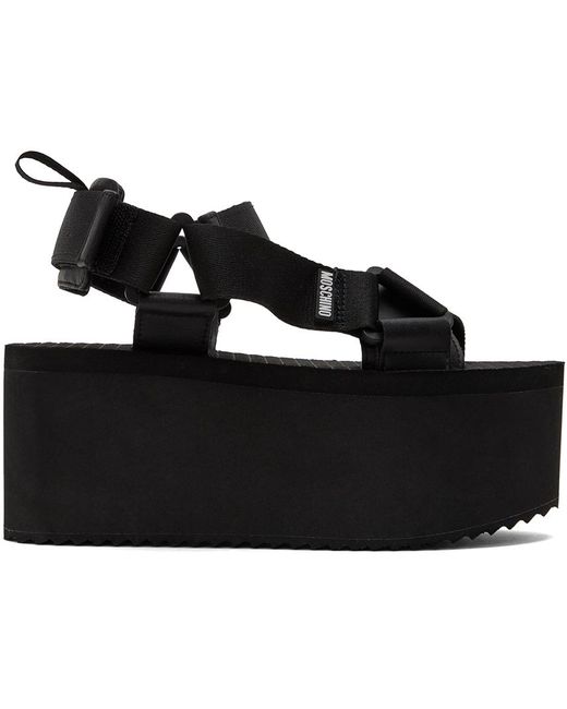 Sandales à talon compensé noires Moschino en coloris Black