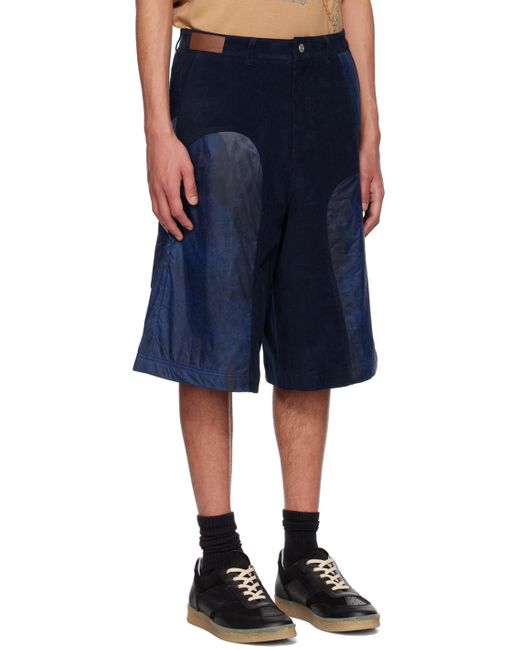 ANDERSSON BELL Blue Paneled Shorts for men