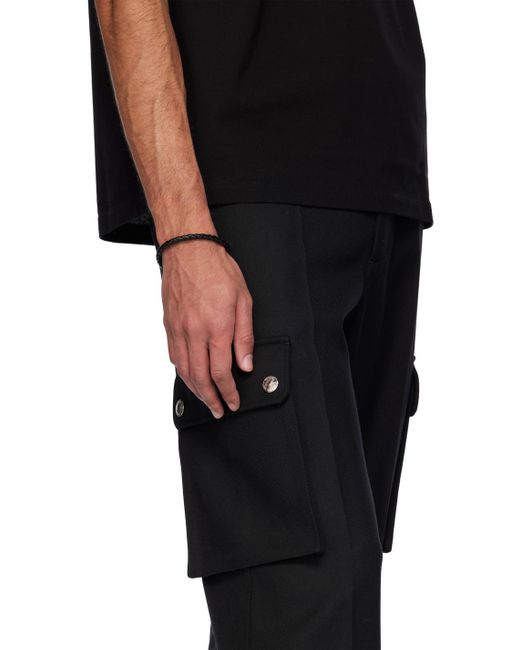 Bracelet noir en cuir tressé à méduse Versace pour homme en coloris Black