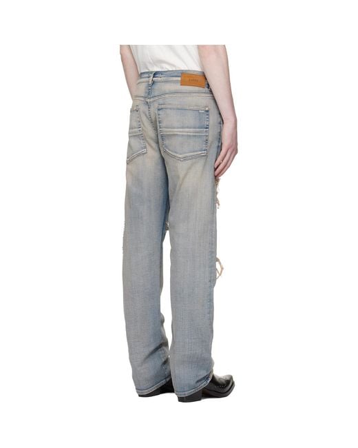 Amiri Blue Snake Stud Slim Jeans for men