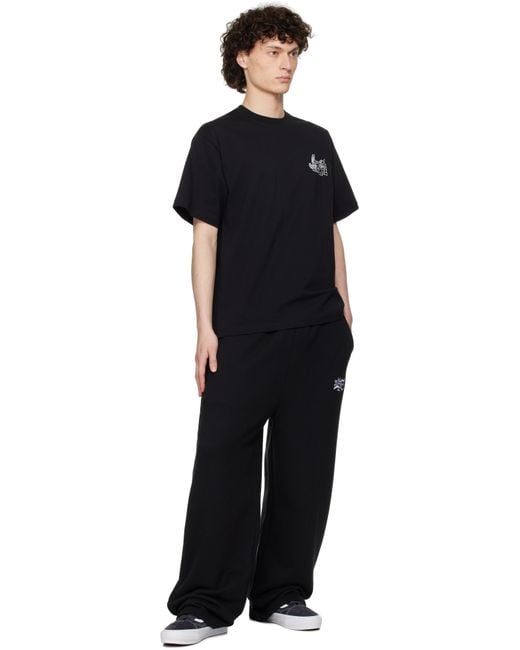 【関税込み】Awake NY ブラック Hammer グラフィックTシャツ Awake NYのブラック Hammer グラフィックTシャツがセール中