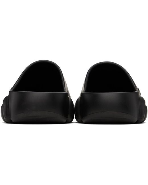 Chaussures à enfiler noires en caoutchouc à semelle en forme d'ourson Moschino en coloris Black