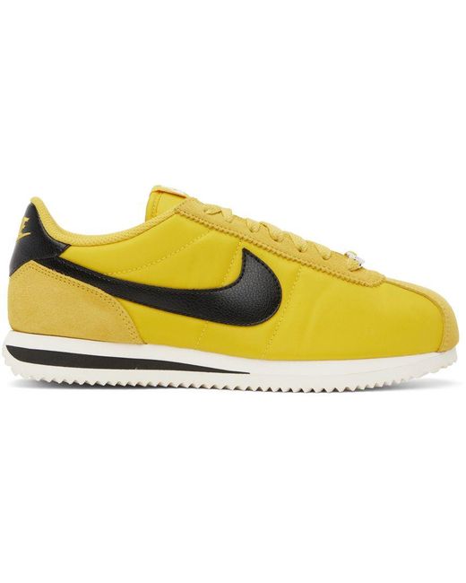 nike cortez black yellow