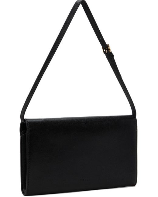 The Row Evening Clutch in Black Lyst UK